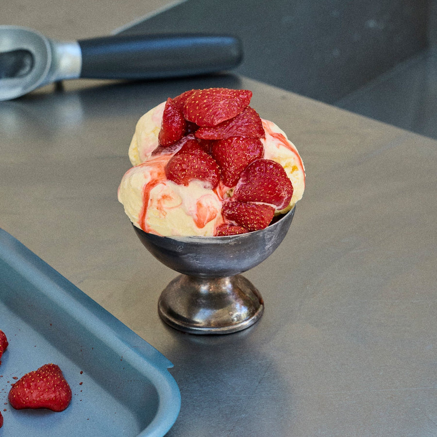 Syrupy roasted strawberries and ice cream